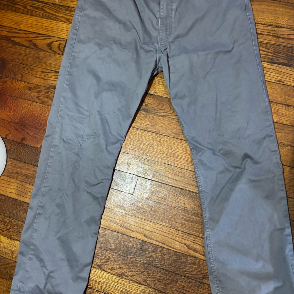 Dockers men's grey straight fit pants featuring a five-pocket jean-cut style